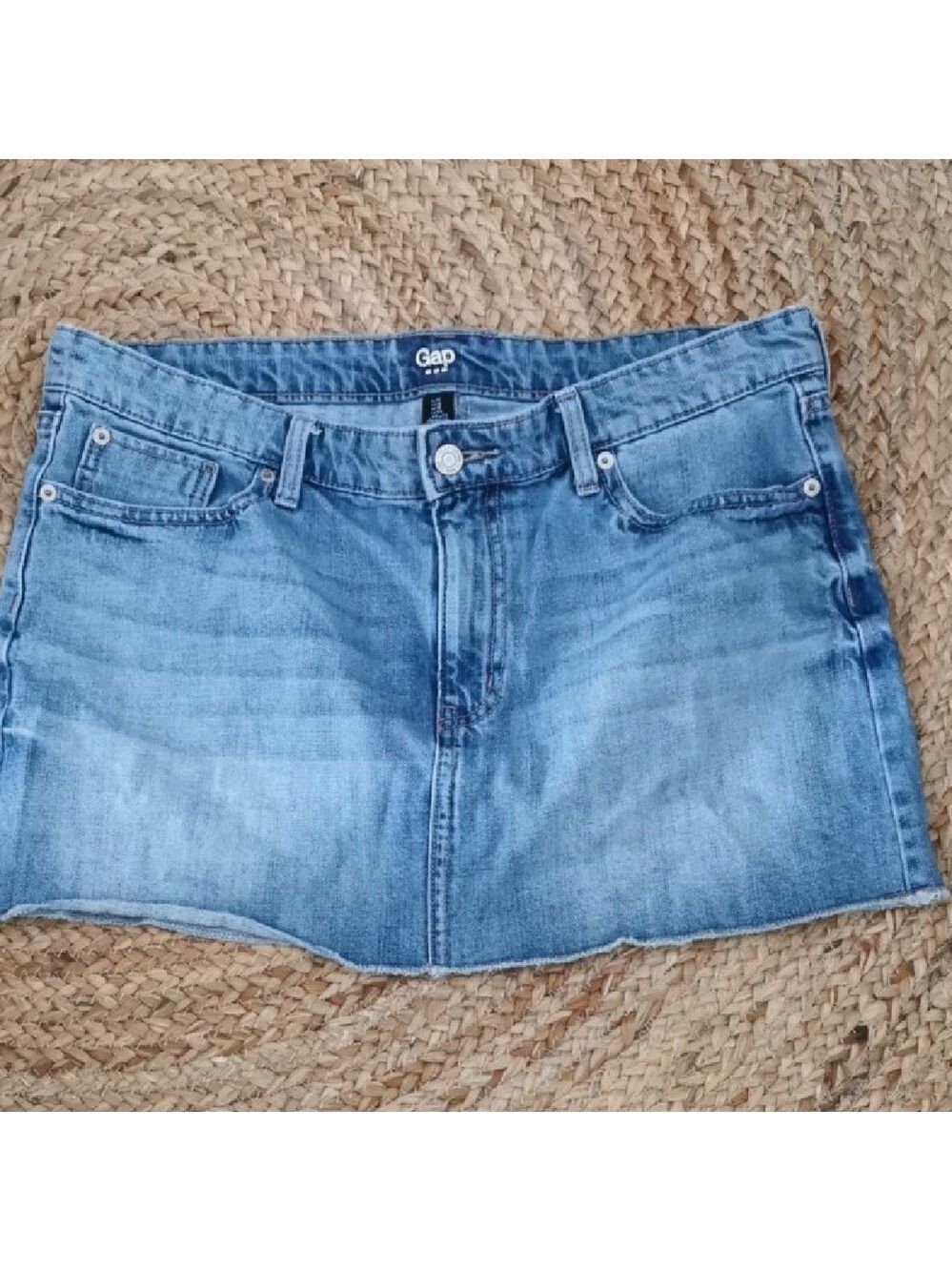 Gap denim mini skirt with raw frayed hem. Size 12